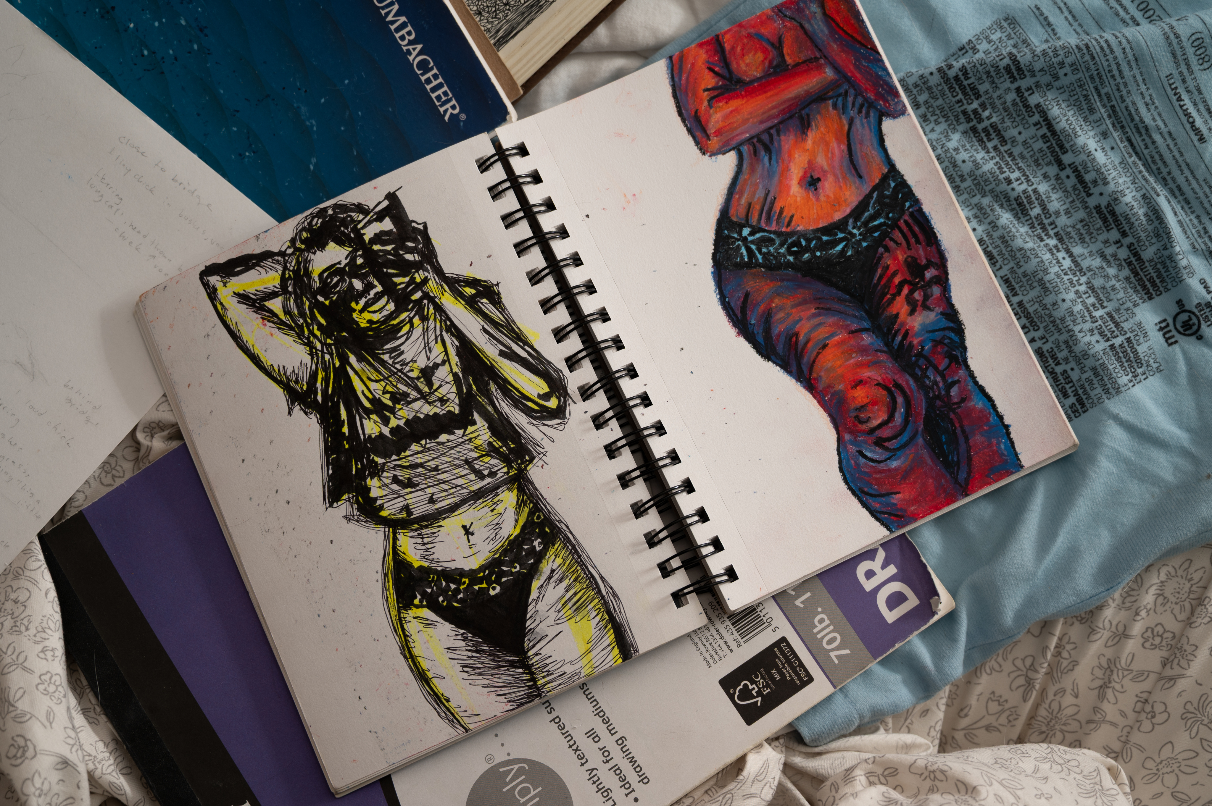 Willow's notebook with his self portraits inside.